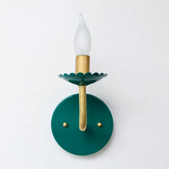 emerald green and brass feminine sconce with scalloped bobeche detail.  Feminine bathroom sconce lighting