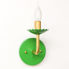 Green & brass modern feminine wall sconce with scalloped details