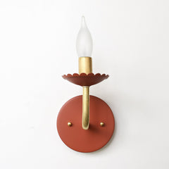 Terra Cotta and Brass feminine wall sconce with scalloped bobeche detail