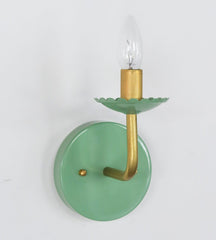 Pastel Green & Brass modern wall sconce with scalloped detail on the bobesche