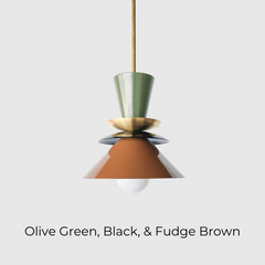Astro pendant light in olive green, black, and fudge brown with brass accent. A colorblocked mid century modern ceiling fixture with earthy, moody tones. Ideal for warm, vintage-inspired kitchens, eclectic dining rooms, or modern rustic interiors. A bold and timeless lighting choice for statement design lovers.