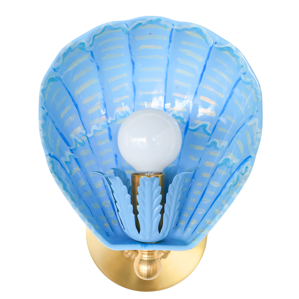 One-of-a-kind Coquille wall sconce in celestial blue, cream, and cobalt hand-painted powdercoated steel with polished brass hardware, handmade in New Orleans and inspired by seashell forms