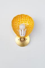 Artistic hand-painted Coquille sconce with bright orange and yellow scalloped steel shade, sealed in clear powdercoat – modern brass wall light for colorful interiors