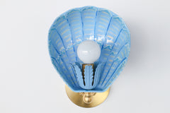 Blue and cream striped Coquille shell sconce with brass backplate and vintage-inspired detailing, whimsical art deco coastal wall lighting, custom hand-painted powder-coated steel
