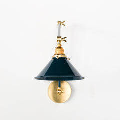 Lagoon & Brass Adjustable wall sconce with a cone shade. Traditional style light fixture in fun colors