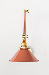 Peach & Brass Adjustable Wall Sconce in a fun color with a cone shade.  Makes a great wall sconce for kitchen lighting, pictures, and more.