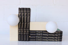 Steel Powdercoated lamp in cream with white glass globe.  Plug in Bookshelf lamp.