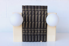Steel Powdercoated lamp in cream with white glass globe.  Plug in Bookshelf lamp.