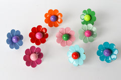 Colorful daisy flower shaped drawer pulls in vibrant colors and hues