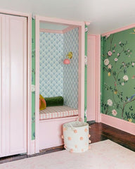 This charming kids’ reading nook features the blush pink Daisy Loa Sconce by Sazerac Stitches, paired with green floral wallpaper, pastel trim, and cozy seating. Perfect inspiration for colorful nurseries, kids’ bedrooms, or playroom design ideas.