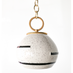 Neutral cream and black speckled geometric pendant lamp with oversized brass loop on brass chain.  Boho style modern Pendant light that can be swagged.  Textural pendant that is perfect for neutral spaces.  Adds a handmade quality to a space.  Designed and assembled in New Orleans.  The ceramic shades are made in North Carolina.
