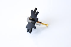 Glossy Black Acrylic & Brass modern and artistic paint splat inspired drawer pull knob.  Colorful asymmetric acrylic drawer pull or knob with brass details. Adds a unique touch to dressers, cabinets, and more.  Comes in pearly, glossy, and translucent acrylic in a ton of colorful option.  Adds a playful touch to 90s aesthetic or a kid-friendly space.  Unique drawer pull made to order in New Orleans. Designed by Sazerac Stitches.  Easy to install!