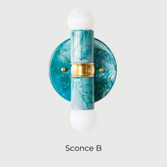Close-up view of the Teal and Grey Marbled Thalia Sconce, a modern double-bulb wall light featuring hand-marbled teal and grey enamel with solid brass accents. This sculptural lighting fixture blends artistic flair with function, making it a standout in bathrooms, powder rooms, or hallways.