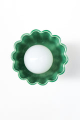 Jade green ceramic flush mount ceiling light with fluted Art Deco silhouette and brass canopy. Handmade sculptural lighting fixture designed for bathrooms, hallways, or entryways. Modern pastel green ceiling light adds a pop of color and vintage-inspired charm to interiors.