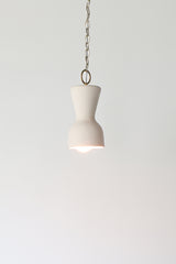 Cream and brass chained ceramic pendant lighting fixture. Made in the USA hand-cast tinted porcelain pendant kitchen light with real raw brass chain.  Beautiful unglazed porcelain ceramic pendant ceiling light fixture.