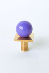 Glossy orchid purple square gumball drawer pull with brass backplate and base. Perfect hardware for colorful cabinets, dressers, or modern nursery furniture. Adds a pop of whimsy to kitchens, bathrooms, kids’ rooms, or vintage-inspired interiors with bold personality.