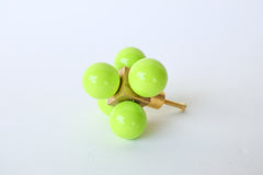 Chartreuse Green Ball-Cube Knob on White Background – A brass cabinet knob with five glossy cobalt blue spheres, featuring a modern geometric design.