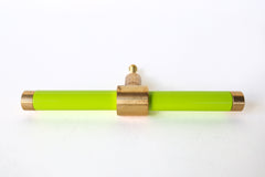 Chartreuse and brass modern drawer pull.  Add color to cabinets with brass accents with the Piety drawer pulls by sazerac stitches.  Available in over 30 colors with the option to customize. Center mount installation drawer pull with color and brass accents.  Sophisticated colorful bathroom, dresser, vanity, or desk drawer pull.