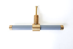 Grey & Brass modern drawer pull.  Add color to cabinets with brass accents with the Piety drawer pulls by sazerac stitches.  Available in over 30 colors with the option to customize. Center mount installation drawer pull with color and brass accents.  Sophisticated colorful bathroom, dresser, vanity, or desk drawer pull.