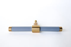 Grey & Brass modern drawer pull.  Add color to cabinets with brass accents with the Piety drawer pulls by sazerac stitches.  Available in over 30 colors with the option to customize. Center mount installation drawer pull with color and brass accents.  Sophisticated colorful bathroom, dresser, vanity, or desk drawer pull.