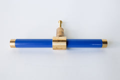 Bright Blue & Brass modern drawer pull.  Add color to cabinets with brass accents with the Piety drawer pulls by sazerac stitches.  Available in over 30 colors with the option to customize. Center mount installation drawer pull with color and brass accents.  Sophisticated colorful bathroom, dresser, vanity, or desk drawer pull.