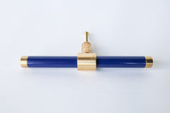 Navy & Brass modern drawer pull.  Add color to cabinets with brass accents with the Piety drawer pulls by sazerac stitches.  Available in over 30 colors with the option to customize. Center mount installation drawer pull with color and brass accents.  Sophisticated colorful bathroom, dresser, vanity, or desk drawer pull.