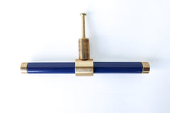 Navy & Brass modern drawer pull.  Add color to cabinets with brass accents with the Piety drawer pulls by sazerac stitches.  Available in over 30 colors with the option to customize. Center mount installation drawer pull with color and brass accents.  Sophisticated colorful bathroom, dresser, vanity, or desk drawer pull.