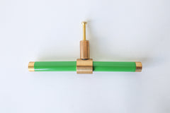 Bright Green and brass modern drawer pull.  Add color to cabinets with brass accents with the Piety drawer pulls by sazerac stitches.  Available in over 30 colors with the option to customize. Center mount installation drawer pull with color and brass accents.  Sophisticated colorful bathroom, dresser, vanity, or desk drawer pull.