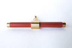 Matte Terra Cotta & Brass modern drawer pull.  Add color to cabinets with brass accents with the Piety drawer pulls by sazerac stitches.  Available in over 30 colors with the option to customize. Center mount installation drawer pull with color and brass accents.  Sophisticated colorful bathroom, dresser, vanity, or desk drawer pull.