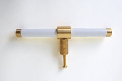White and brass modern drawer pull.  Add color to cabinets with brass accents with the Piety drawer pulls by sazerac stitches.  Available in over 30 colors with the option to customize. Center mount installation drawer pull with color and brass accents.  Sophisticated colorful bathroom, dresser, vanity, or desk drawer pull.