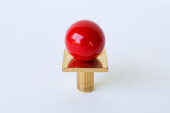 Vibrant red Square Gumball Knob with brass accents, ideal for colorful cabinet hardware, dresser drawers, or custom furniture upgrades. Adds playful character to kids’ rooms, bold contrast in kitchens, or fun detail in bathrooms. Modern, handmade knob designed for everyday joy and color.