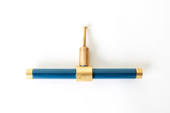 Lagoon Blue and brass modern drawer pull.  Add color to cabinets with brass accents with the Piety drawer pulls by sazerac stitches.  Available in over 30 colors with the option to customize. Center mount installation drawer pull with color and brass accents.  Sophisticated colorful bathroom, dresser, vanity, or desk drawer pull.