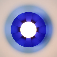 blue pop-art inspired wall sconce with etched stripes and a white glass globe.  Adds whimsy to any space.