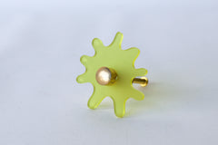 Frosted Yellow Acrylic & Brass modern and artistic paint splat inspired drawer pull knob.  Colorful asymmetric acrylic drawer pull or knob with brass details. Adds a unique touch to dressers, cabinets, and more.  Comes in pearly, glossy, and translucent acrylic in a ton of colorful option.  Adds a playful touch to 90s aesthetic or a kid-friendly space.  Unique drawer pull made to order in New Orleans. Designed by Sazerac Stitches.  Easy to install!