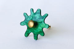 Emerald Green Pearl Acrylic & Brass modern and artistic paint splat inspired drawer pull knob.  Colorful asymmetric acrylic drawer pull or knob with brass details. Adds a unique touch to dressers, cabinets, and more.  Comes in pearly, glossy, and translucent acrylic in a ton of colorful option.  Adds a playful touch to 90s aesthetic or a kid-friendly space.  Unique drawer pull made to order in New Orleans. Designed by Sazerac Stitches.  Easy to install!