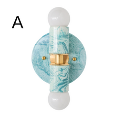 Hand-marbled modern two light wall sconce light fixture in pastel teal and.  Designed and made in New Orleans.  Colorful marbled lighting perfect for a maximalist bathroom, a pattern-loving interior designer, and more.  Each light fixture is unique.