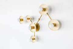 Cream and brass virgo zodiac constellation wall light fixture by Sazerac Stitches