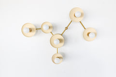 Cream and brass virgo zodiac constellation wall light fixture by Sazerac Stitches