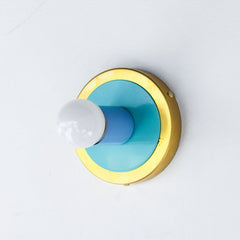 Pastel Blue and robins egg blue with brass flushmount ceiling light fixture or wall sconce.  Pop art inspired lighting that adds vibrant color to any space