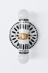 Handpainted black and white patterned wall sconce inspired by Greece & Portugal.  Maximalist style wall sconce that has a natural element because each one is hand-painted.  The painted thalia is a perfect small sconce that doubles as a statement light fixture because of the bold design.  Great for bathrooms, hallways, and more.