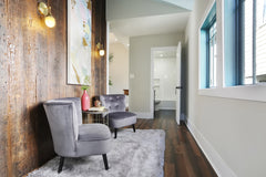 Reclaim wood walls, large hallways with sitting room and antique style brass lights