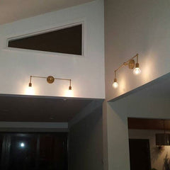 brass accent lighting high ceilings