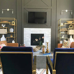 chrome sconces accent lighting over bookcases