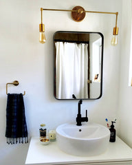 modern brass vanity fixture brass lighting bathroom