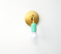 simple mint and brass sconce modern sazerac stitches