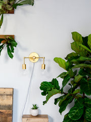small magazine wall sconce brass lighting midcentury modern inspired