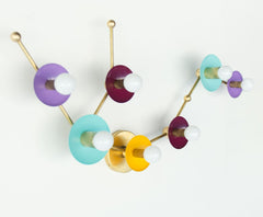 purple, mustard, teal, and brass Aquarius Constellation light inspired by astrology.  Flushmount ceiling light fixture or large wall sconce in brass