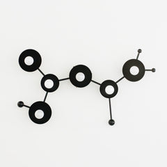 Matte Black modern light fixture in the shape of a sagittarius star constellation