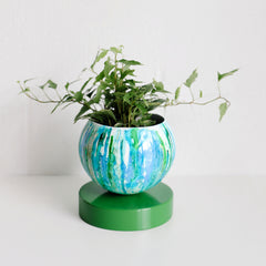 blue and green watercolor planter with ivy plant