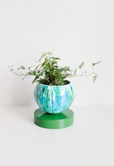 blue and green watercolor planter with ivy plant